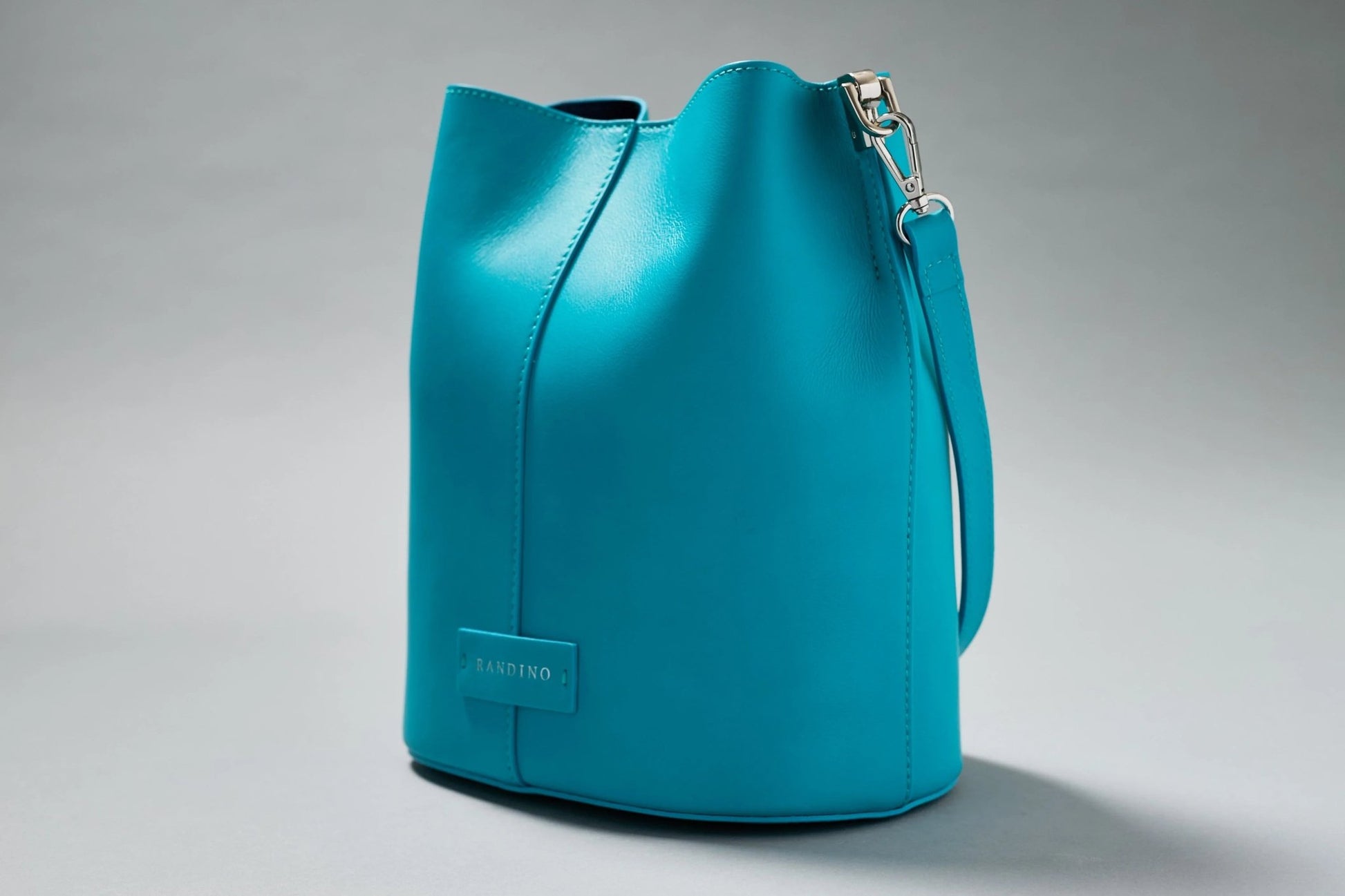 Black streetwear bucket bag by Randino – minimalist design